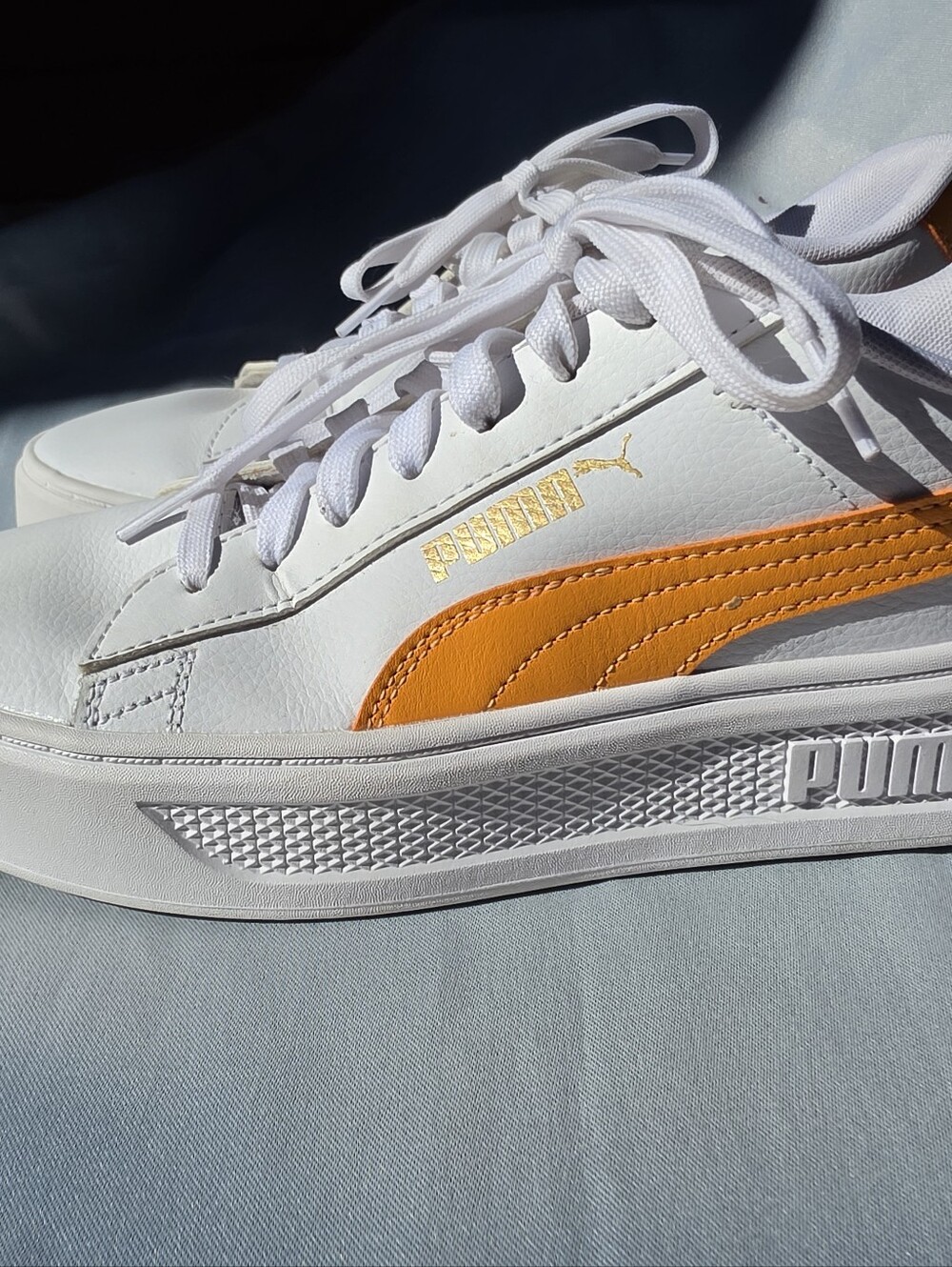 Puma Women’s White Sneakers with Orange Formstrip and Gold Logo